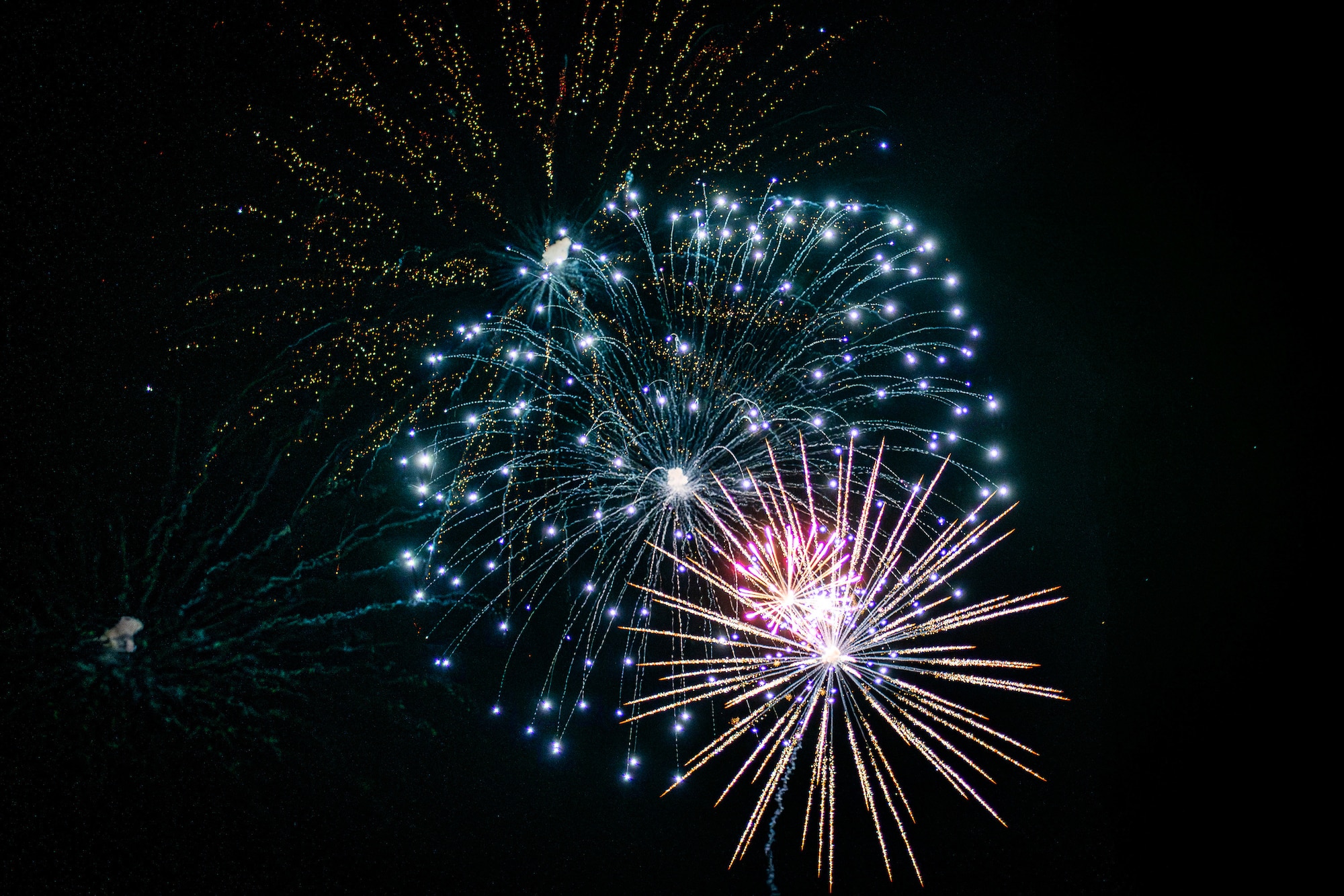 Fireworks light up the night sky over Edwards Air Force Base during Summer Bash, July 4. (Air Force photo by Giancarlo Casem)