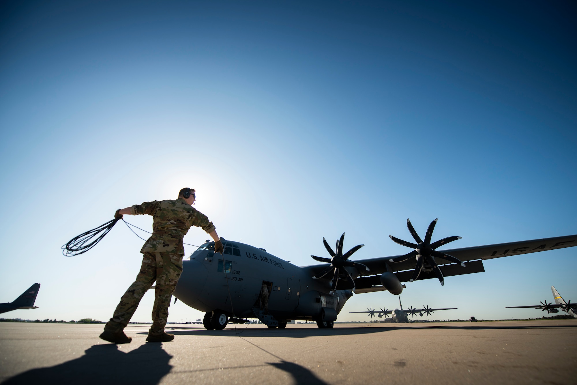 A loadmasters observes a C-130H Hercules.