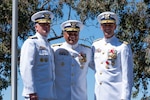 U.S. Coast Guard Rear Adm. Jeffrey Novak, commander Southwest District, Vice Adm. Andrew Tiongson, commander Pacific Area, and Rear Adm. Joseph Buzzella pose for a photo during a change-of-command ceremony at Coast Guard Island in Alameda, Calif. July 8, 2025.