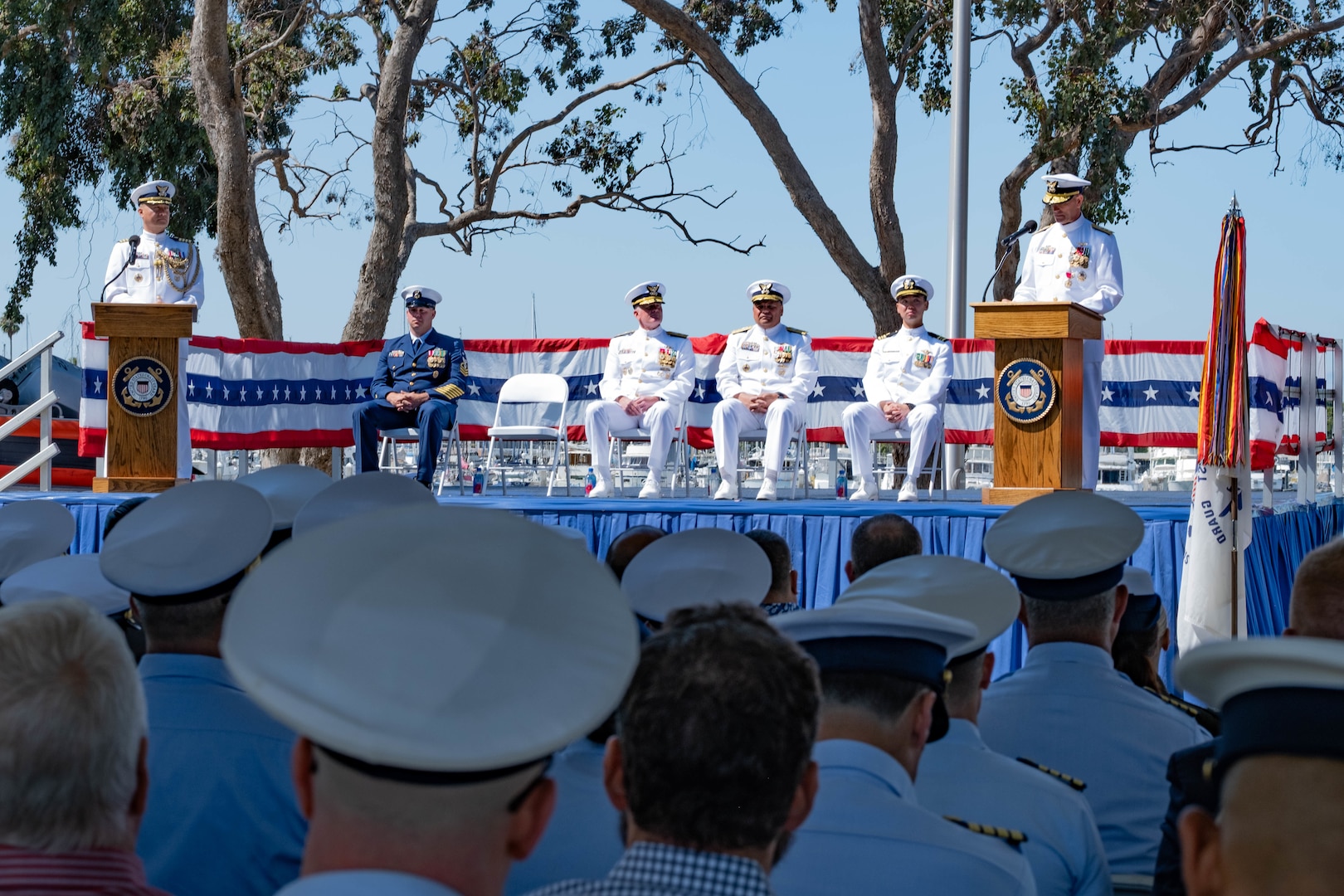 U.S. Coast Guard members attend a change-of-command ceremony at Coast Guard Island in Alameda, Calif., July 8, 2025.