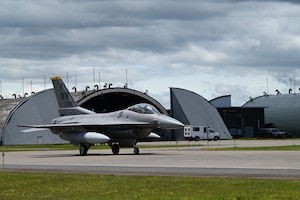A U.S. Air Force F-16 Fighting Falcon assigned to the 14th Fighter Squadron taxis to the runway at Misawa Air Base, Japan, June 27, 2025.