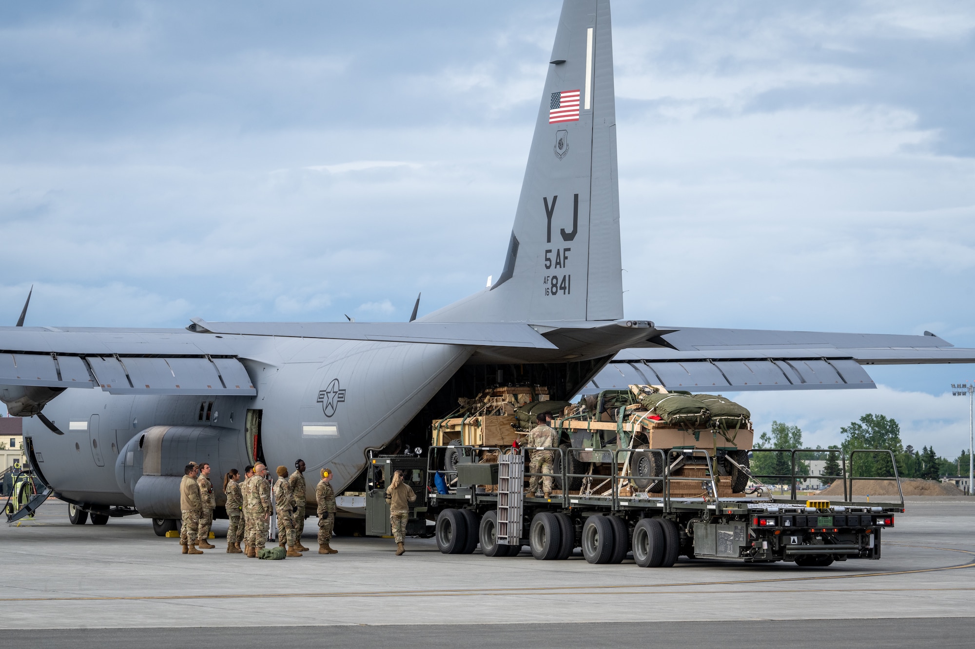 Cargo is loaded into an aircraft.
