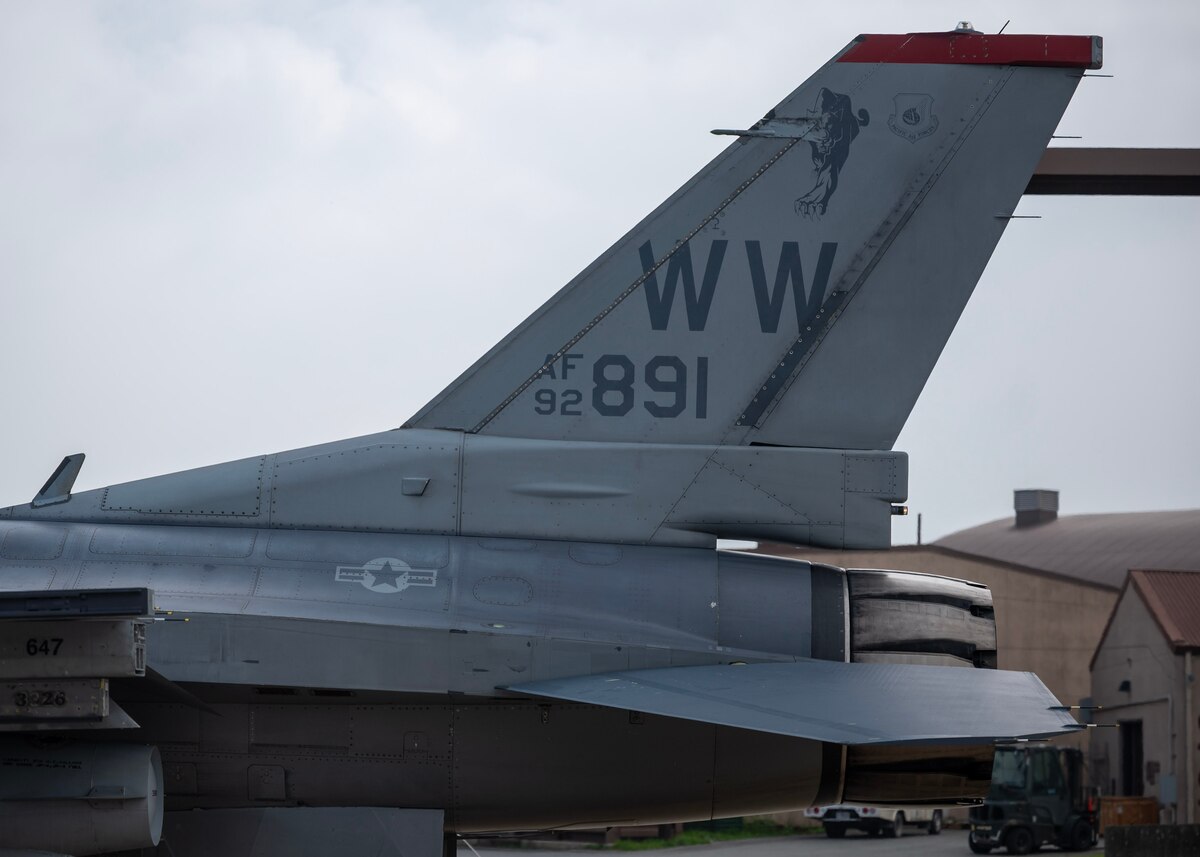 An F-16 Fighting Falcon assigned to the 13th Fighter Squadron sits on the flightline at Osan Air Base, Republic of Korea, June 26, 2025. The migration of aircraft from Misawa Air Base, Japan to Osan enhances alignment between U.S. forces in Japan and South Korea, maximizing interoperability for joint operations and bilateral training. (U.S. Air Force photo by Staff Sgt. Sarah Williams)