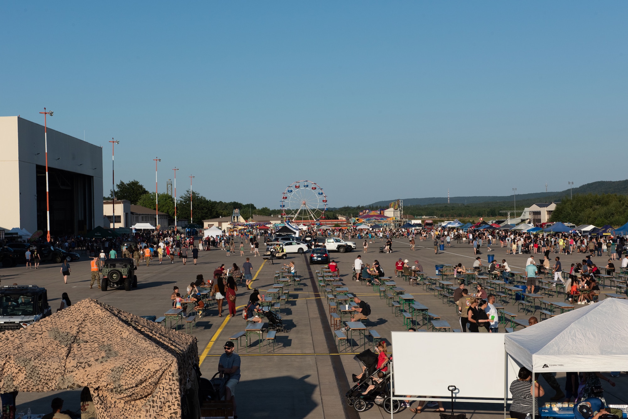 Freedom and Friendship Fest attendees gather on the flightline at Ramstein Air Base, Germany, July 3, 2025.