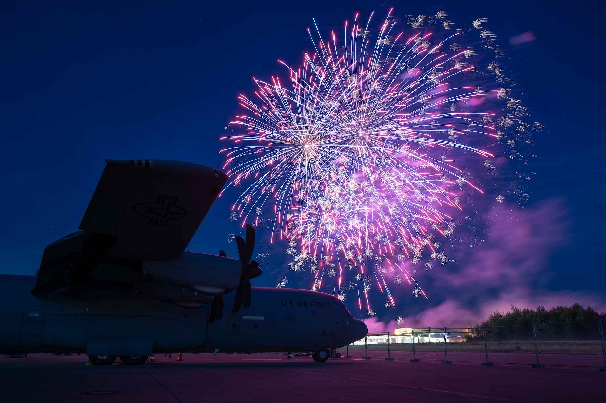 A U.S. Air Force C-130J Super Hercules is on display during a fireworks show at Ramstein Air Base, Germany, July 4, 2025.