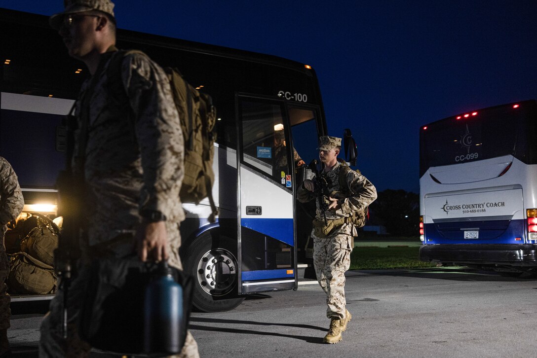 U.S. Marines with 6th Marine Regiment, 2d Marine Division arrive at Marine Corps Air Station Cherry Point, North Carolina, July 7, 2025. 6th Marine Regiment is participating in a Service Level Training Exercise to create a challenging, realistic training environment that produces combat-ready forces capable of operating as an integrated Marine Air Ground Task Force. (U.S. Marine Corps photo by Lance Cpl. Judith Ann Lazaro)