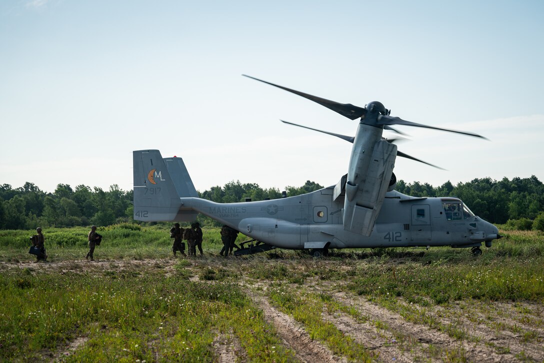 U.S. Marines with 4th Marine Aircraft Wing disembark and offload equipment from an MV-22 Osprey with Marine Medium Tiltrotor Squadron 764 (VMM-764) in support of a ‘jump’ combat operations center event during Atlantic Alliance 25 (AA25) at Fort Drum, New York, July 7, 2025.

AA25 maintains joint amphibious capabilities while implementing aircraft and ground support elements.

Utilizing the MV-22 platform allows Marines to support the transportation of ground personnel and equipment in demanding and adverse environments. (U.S. Marine photo by Cpl. Ujian Gosun)