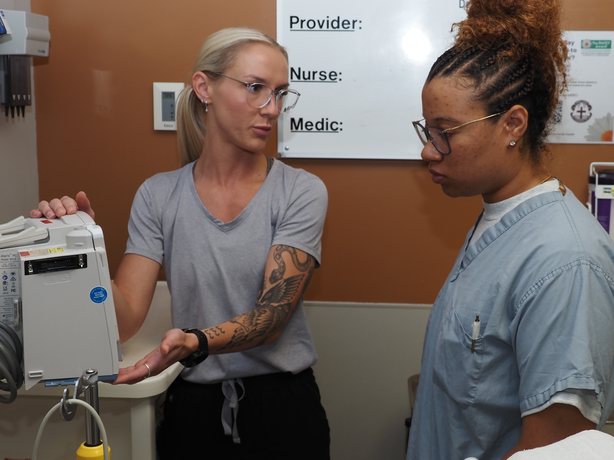 Tara Kubsch, a registered nurse in the EACH Emergency Department, trains in Senior Airman Diamond Cunningham, an aerospace medical technician from the 910th Medical Squadron from Youngstown Air Reserve Station, Ohio.