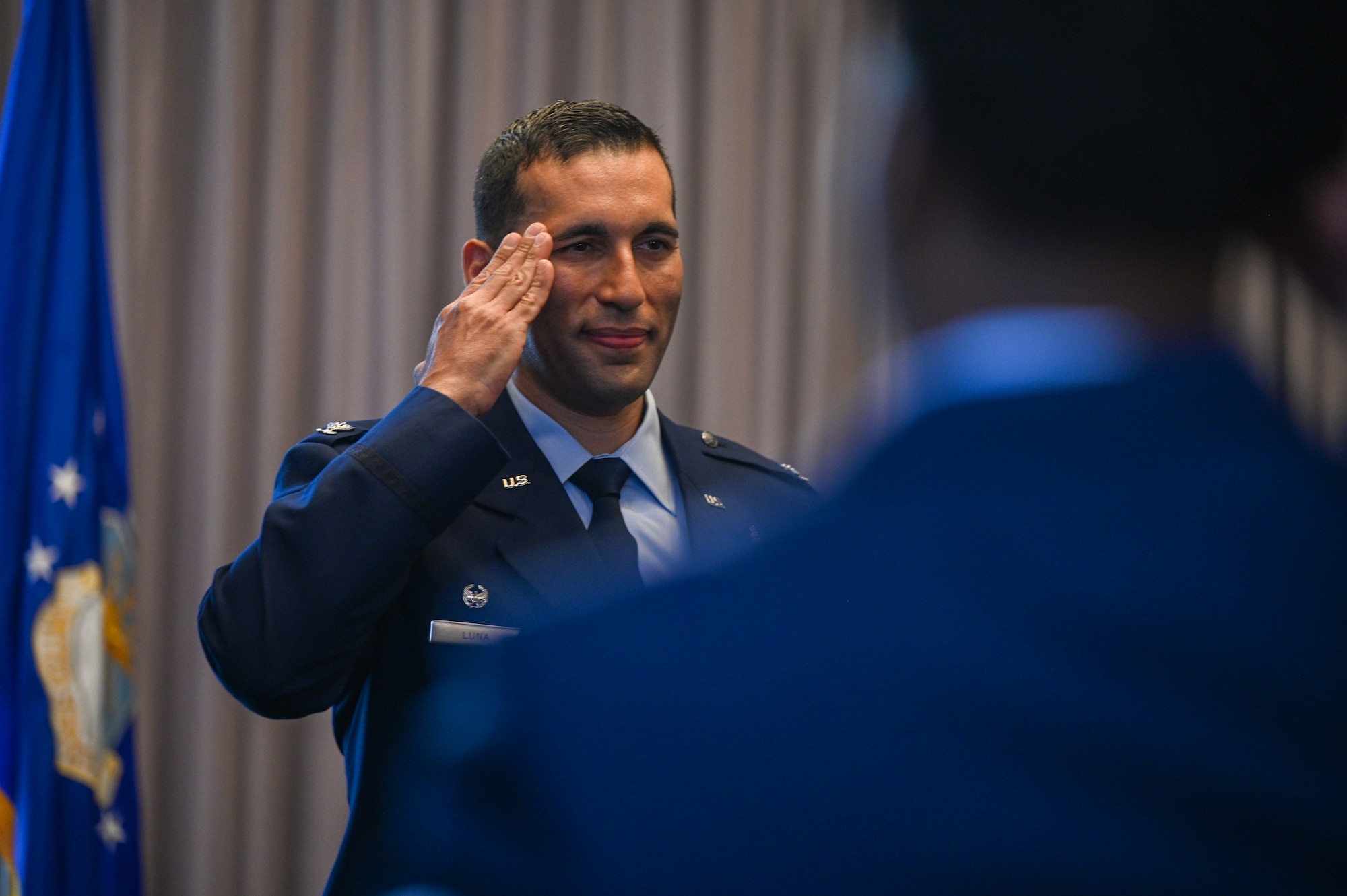 U.S. Air Force Col. Michael S. Luna renders his first salute to members of the Bolling Medical Squadron at Joint Base Anacostia-Bolling during his assumption of command at JBAB, Washington, D.C., July 8, 2025. Luna previously commanded the 75th Healthcare Operations Squadron at Hill Air Force Base, Utah and will lead the Bolling Medical Squadron as they provide essential healthcare services including primary care, dental services and specialty medical support for patients across the National Capital Region. (U.S. Air Force photo by Airman 1st Class Shanel Toussaint)