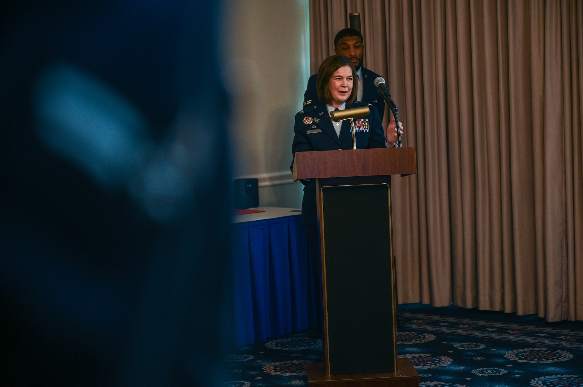 U.S. Air Force Col. Stacy Friesen, commander of the Andrews Medical Group at Joint Base Andrews, introduces U.S. Air Force Col. Michael S. Luna as the incoming Bolling Medical Squadron commander for Joint Base Anacostia-Bolling during the assumption of command ceremony at JBAB, Washington, D.C., July 8, 2025. Luna previously commanded the 75th Healthcare Operations Squadron at Hill Air Force Base, Utah and will lead the Bolling Medical Squadron in delivering comprehensive medical care and maintaining readiness for patients across the National Capital Region. (U.S. Air Force photo by Airman 1st Class Shanel Toussaint)