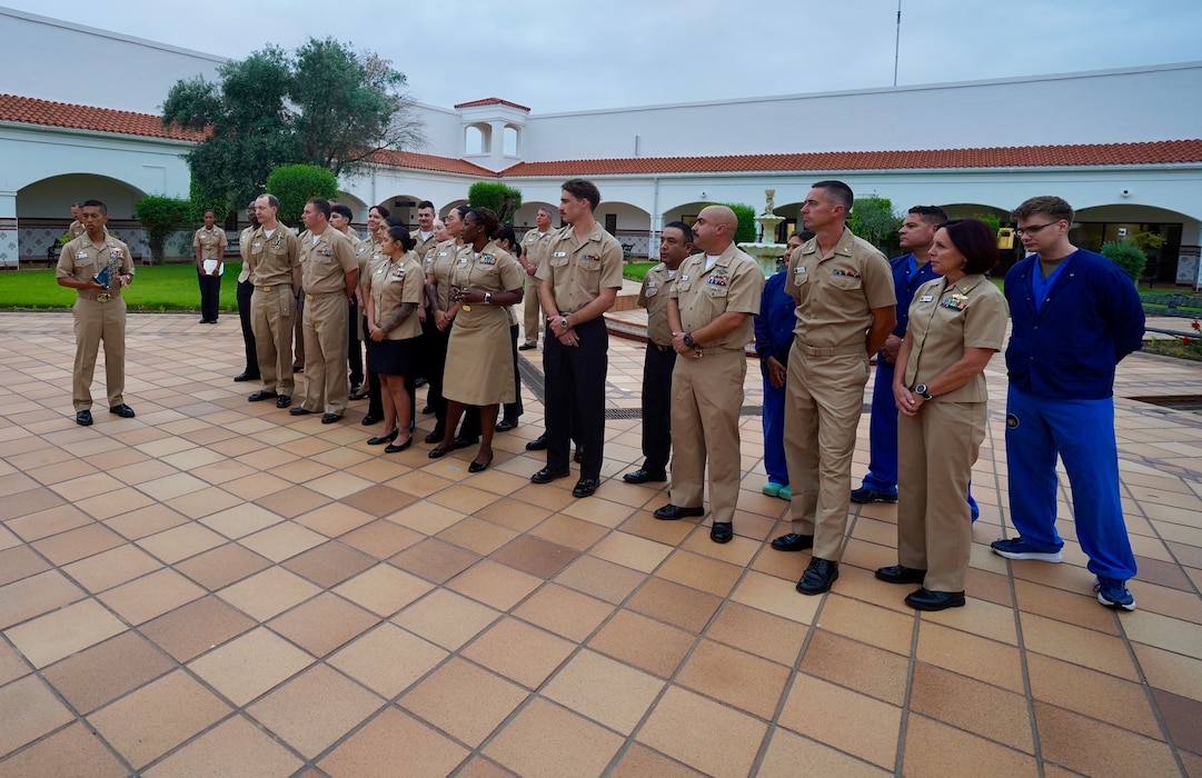 250709-N-FT324-5331. ROTA, Spain (July 9, 2025). U.S. Naval Hospital Rota Director, Capt. Michael Mercado, proudly presented the Association of periOperative Registered Nurses (AORN) Go Clear Award to the Surgical Services team, marking a historic achievement as the first Military Treatment Facility (MTF) in the U.S. European Command (EUCOM) to earn this prestigious national certification for eliminating surgical smoke in operating rooms. (U.S. Navy Photo Released by Lt. Cmdr. Alicia Sacks)