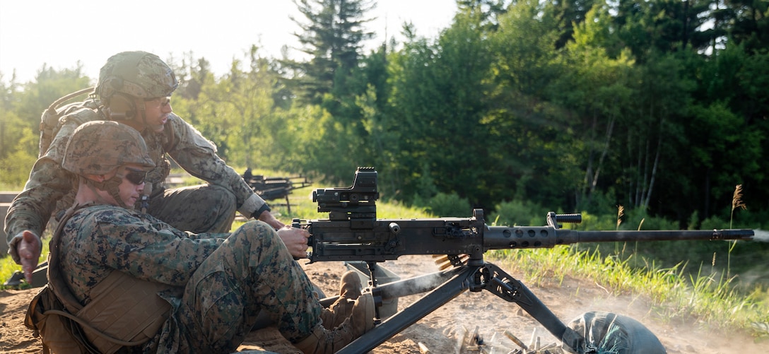 U.S. Coast Guardsmen with Port Security Unit 309 and Marines with 4th Marine Aircraft Wing fire an M2 .50 caliber machine gun in a joint live-fire range during Atlantic Alliance 25 (AA25) at Fort Drum, New York, July 5, 2025. AA25 maintains joint amphibious capabilities while implementing aircraft and ground support elements. During this evolution of AA25, Coast Guardsmen and Marines demonstrated their proficiency in infantry and combined arms tactics in a joint environment. (U.S. Marine Corps photo by Cpl. Ujian Gosun)