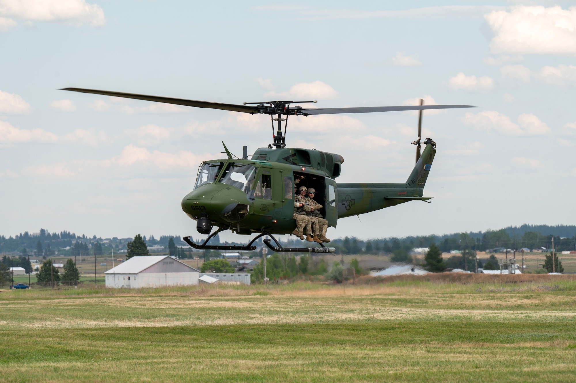 Airmen participate in a paradrop sortie.