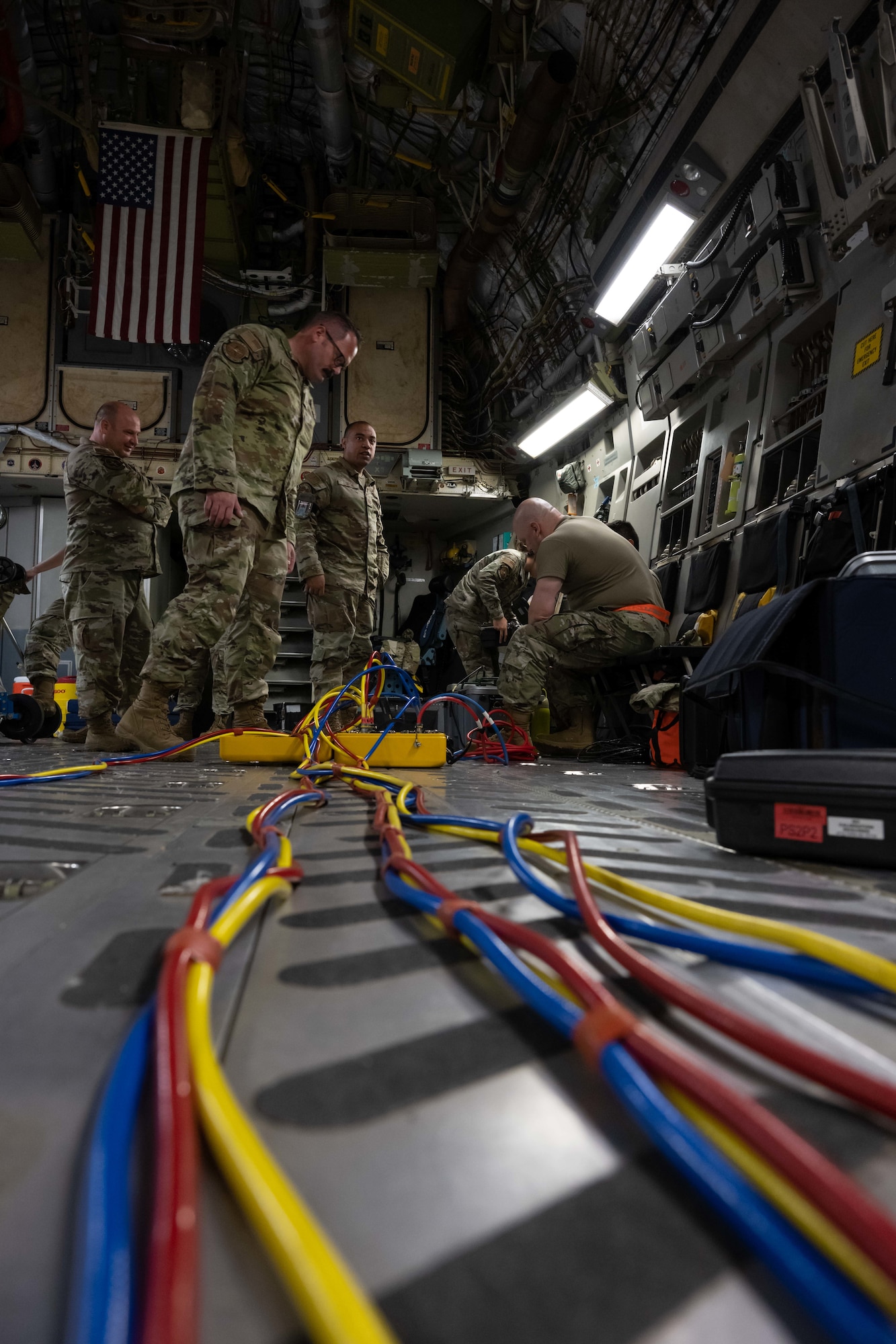 Airmen from the 105th Aircraft Maintenance Squadron and U.S. Air Force Reserve 315th Aircraft Maintenance Squadron work on a C-17 Globemaster III.