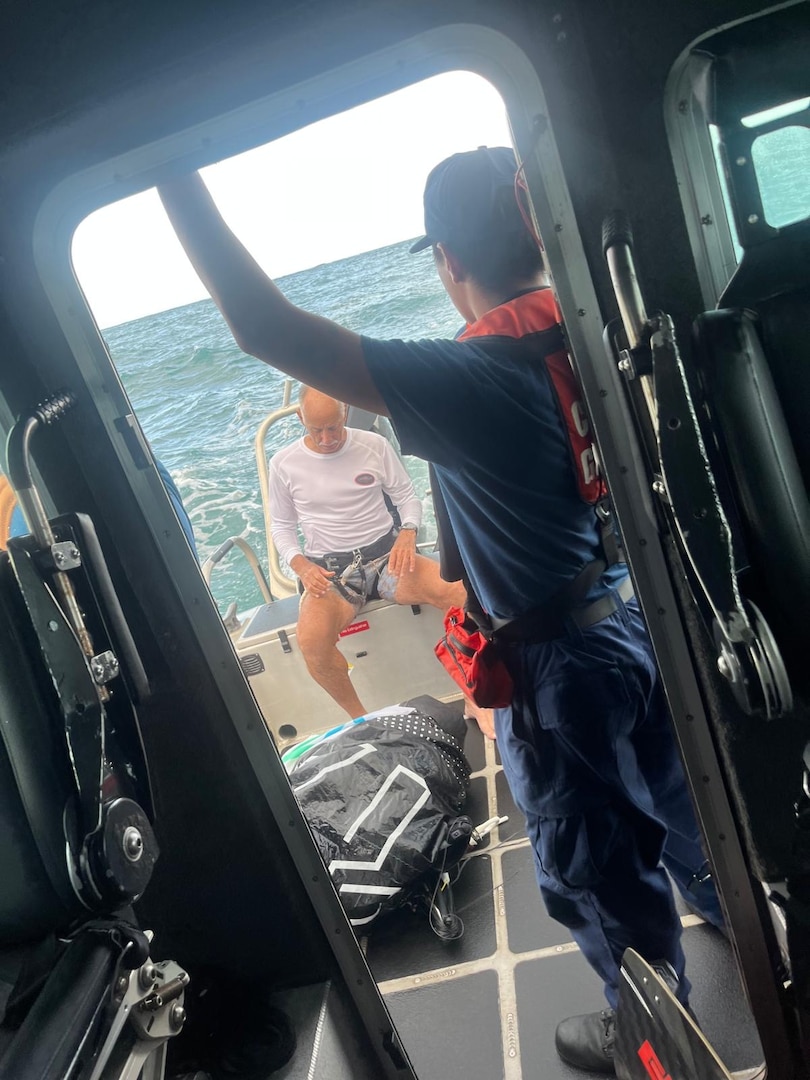 A kite surfer who was beset by weather is aboard a Coast Guard Station San Juan 33-foot Special Purpose Craft after being rescued off Ocean Park Beach in San Juan, Puerto Rico, Tuesday evening.  The Coast Guard boat crew rescued one other kite surfer, while a responding Puerto Rico Police marine unit rescued four others. No injuries were reported in this case. (U.S. Coast Guard photo)