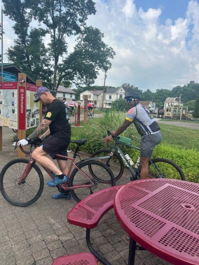 Army Capt. Nate Wilson (left), Pittsburgh MEPS operations officer, and Army Maj. Amaquah Bonsu (right), Pittsburgh MEPS commander, participate in a charity bike ride to support veterans. Bonsu and Wilson participated in the annual 60 Miles for Veterans charity bike ride in Connellsville, Pa. raising more than $2,300 for local veterans.