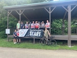 Participants of annual 60 Miles for Veterans charity bike ride in Connellsville, Pa. pose for a group photo. Army Maj. Amaquah Bonsu, Pittsburgh MEPS commander, and Army Capt. Nate Wilson participated in the charity bike ride, raising more than $2,300 for local veterans.