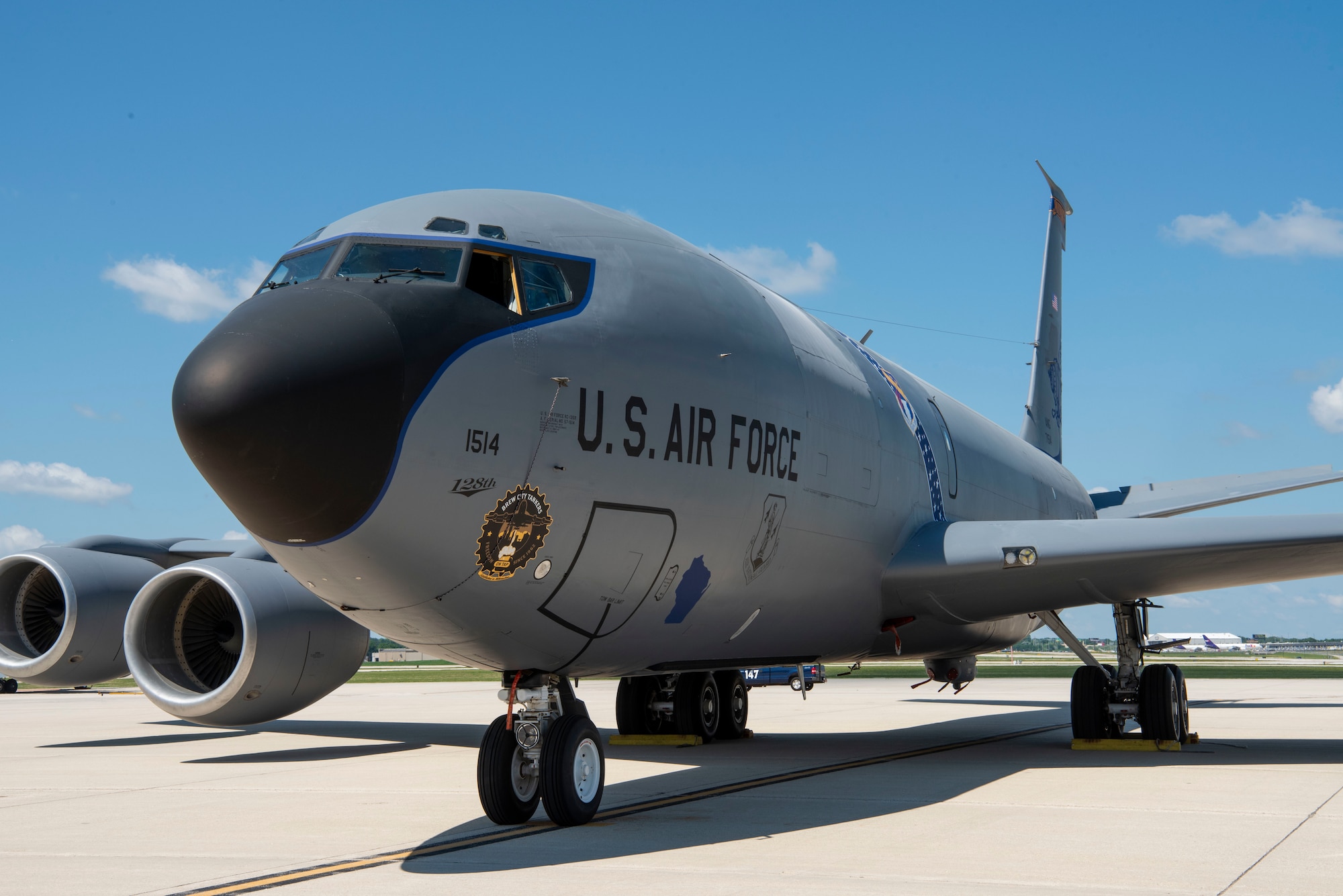 128th Air Refueling Wing Command Jet’s newest nose design features a blue eyebrow, the border surrounding the windows, instead of red as traditionally seen on Wisconsin KC-135 Stratotankers, General Mitchell Air National Guard Base, Milwaukee, WI, July 1, 2025. The bold color shift sets the Command Jet apart from other KC-135 aircraft at the unit. (U.S. Air National Guard photo by Airman 1st Class Cynthia Yang, 128th Air Refueling Wing Public Affairs Specialist)
