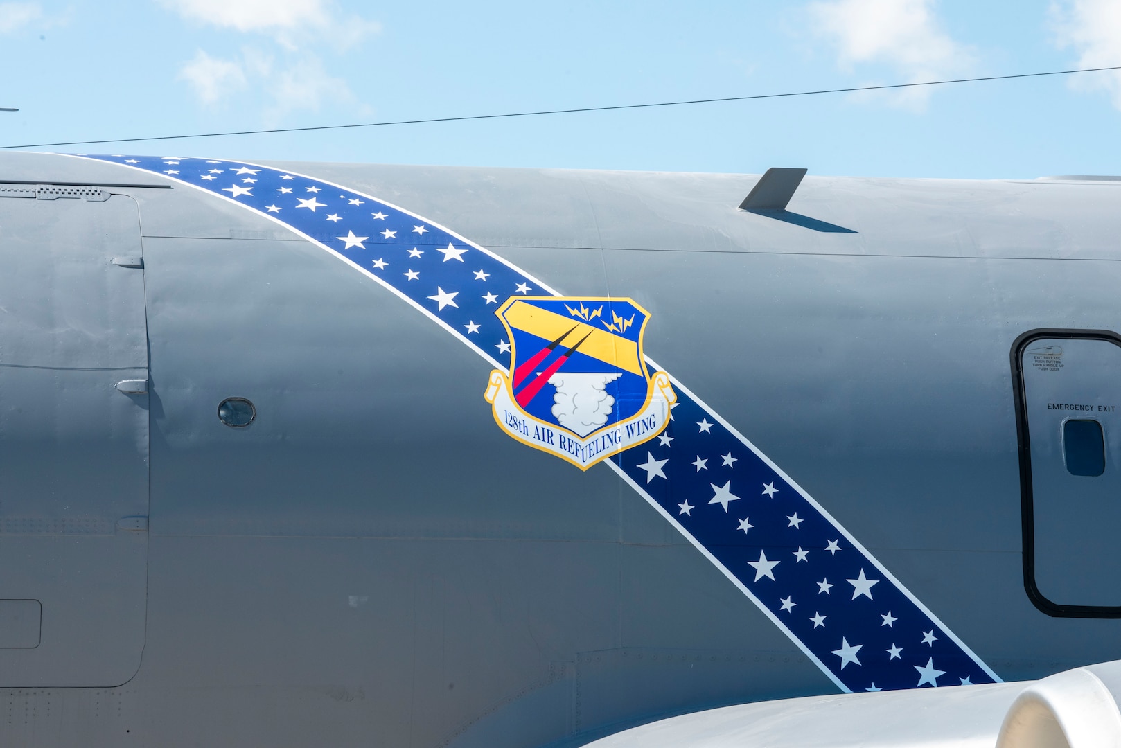 The 128th Air Refueling Wing Command Jet’s heritage design includes a stripe displaying stars, paying homage to the unit’s history while under the Strategic Air Command, General Mitchell Air National Guard Base, Milwaukee, WI, July 1, 2025. The star-adorned stripe serves as a visual tribute to the unit’s longstanding heritage and service. (U.S. Air National Guard photo by Airman 1st Class Cynthia Yang, 128th Air Refueling Wing Public Affairs Specialist)