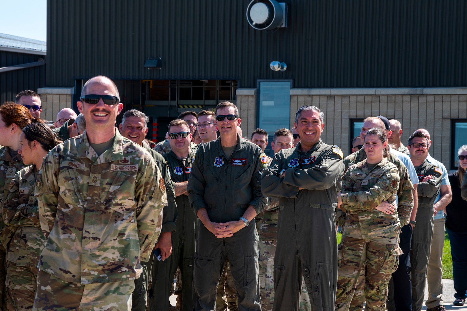U.S. Air Force Airmen assigned to the 128th Air Refueling Wing, smile as the KC-135 Command Jet undergoes a foreign object degree (FOD) check following its heritage design unveiling, General Mitchell Air National Guard Base, Milwaukee, WI, July 1, 2025. The inspection marks a celebratory moment while ensuring safety remains a top priority. (U.S. Air National Guard photo by Airman 1st Class Cynthia Yang, 128th Air Refueling Wing Public Affairs Specialist)