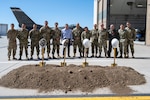 The 140th Civil Engineering Squadron along with Wing leadership celebrate a ground-breaking ceremony for a corrosion control facility at Buckley Space Force Base, Colorado, May 20, 2025. The facility will be able to house a standard fighter jet and will serve as a fire suppression and decontamination area among additional functions. (U.S. Air National Guard photo by Tech. Sgt. Chance Johnson)