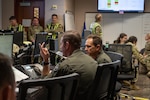 Members of the 140th Wing analyze the wing’s effectiveness during Exercise Centennial Strike at the Wing Operations Center on Buckley Space Force Base, Colorado, June 6, 2025.  Exercise Centennial Strike assessed the readiness and operational agility of the 140th Wing in a contested and degraded environment through a simulated high-end conflict scenario. (U.S. Air National Guard Photo by Senior Airman Eliana Raspet)