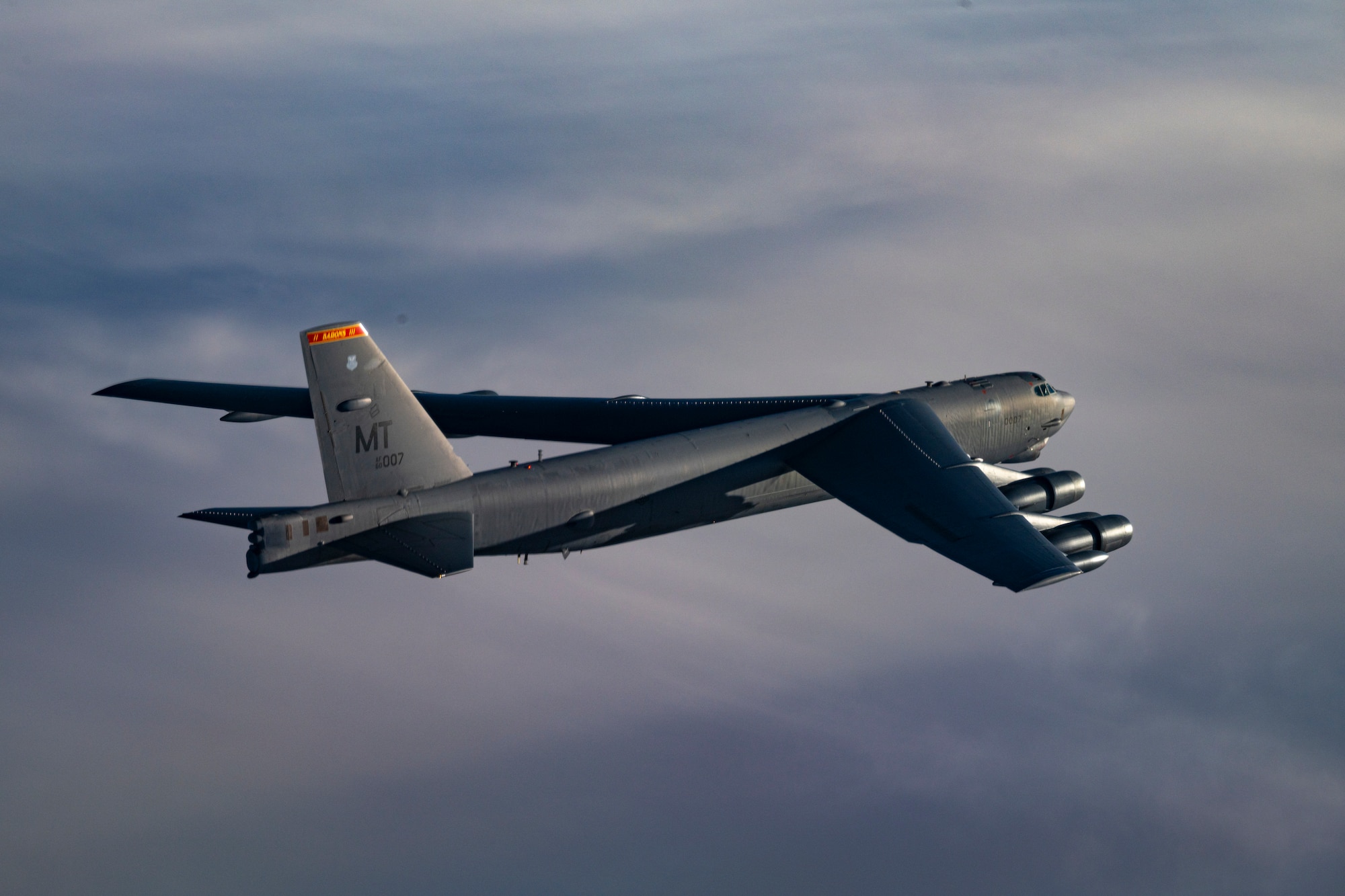 A U.S. Air Force B-52H Stratofortress from the 69th Expeditionary Bomb Squadron flies over the skies of Sweden for their celebration of their acceptance into NATO during Bomber Task Force 25-2, RAF Fairford, United Kingdom, March 11, 2025. These operations demonstrate the ability to rapidly deploy strategic assets in support of global stability. (U.S. Air Force photo by Master Sgt. Chris Hibben)