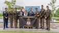 U.S. Army Soldiers from the 25th Infantry Division based out of Hawaii pose with Lee, Kwon Jae, mayor of Osan city, and distinguish visitors during the 75th Task Force Memorial Ceremony at the Jukmiryeong War Memorial in Osan, South Korea, July 3, 2025.
