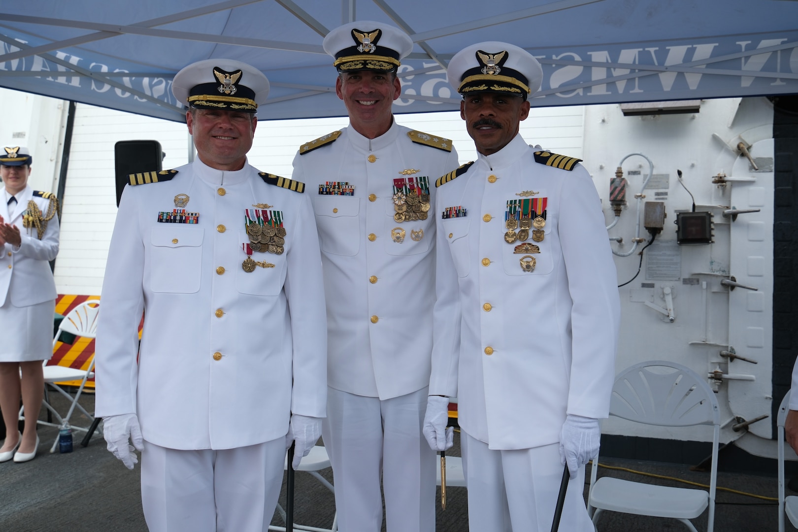 The Coast Guard Cutter Hamilton held a change of command ceremony in Panama on July 9, 2025. During the ceremony, which was presided over by Vice Adm. Nathan Moore, the commander of Coast Guard Atlantic Area, Capt. Justin M. Carter (left) was relieved by Capt. John B. McWhite (right). (U.S. Coast Guard photo by Petty Officer 2nd Class Jackson Ludwig)