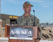 Naval Surface Warfare Center Panama City Division Commanding Officer Capt. Paul Stence, Jr., addresses the crowd at the NSWC PCD Subsea & Seabed Warfare Facility, July 9. He praised the hard work and dedication of countless individuals who are supporting the warfighters both now and, in the future, through this project. (U.S. Navy photo by Eddie Green)