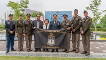 U.S. Army Soldiers from the 25th Infantry Division based out of Hawaii pose with Lee, Kwon Jae, mayor of Osan city, and distinguish visitors during the 75th Task Force Memorial Ceremony at the Jukmiryeong War Memorial in Osan, South Korea, July 3, 2025.