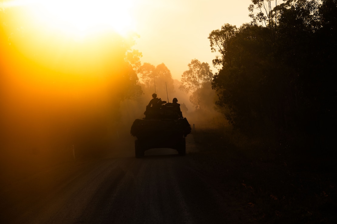 U.S. Marines with 1st Light Armored Reconnaissance Company, Battalion Landing Team 1st Battalion, 7th Marine Regiment, 31st Marine Expeditionary Unit, conduct a mechanized patrol on Light Armored Vehicles during a force on force exercise at Shoal Water Bay Training Area, Queensland, Australia, July 4, 2025. Marines participated in this training in order to refine their lethality and interoperability against one another. The 31st MEU is operating aboard ships of the USS America Amphibious Ready Group in the 7th Fleet area of operations, the U.S. Navy’s largest forward-deployed numbered fleet, and routinely interacts and operates with allies and partners in preserving a free and open Indo-Pacific region. (U.S. Marine Corps photo by Lance Cpl. Raul Sotovilla)