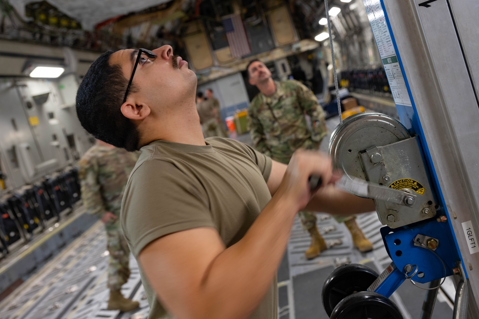 Airmen from the 105th Aircraft Maintenance Squadron and U.S. Air Force Reserve 315th Aircraft Maintenance Squadron work on a C-17 Globemaster III.