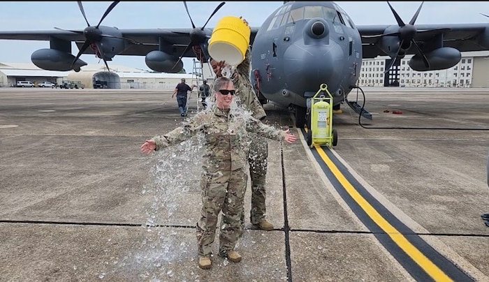 Image of Airmen posing for a photo.