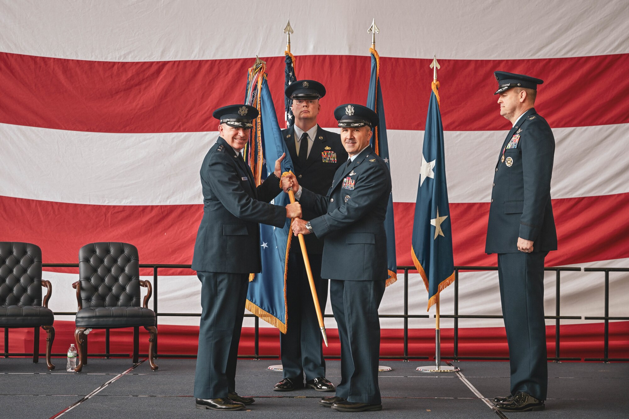 A guidon is passed during a change of command ceremony.