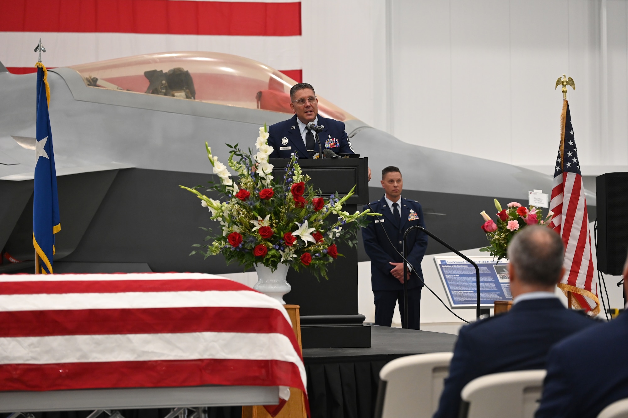 Bornemeier speaks in front of family members and guests of the memorial service.