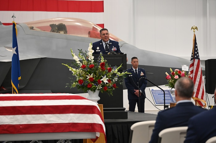 Bornemeier speaks in front of family members and guests of the memorial service.