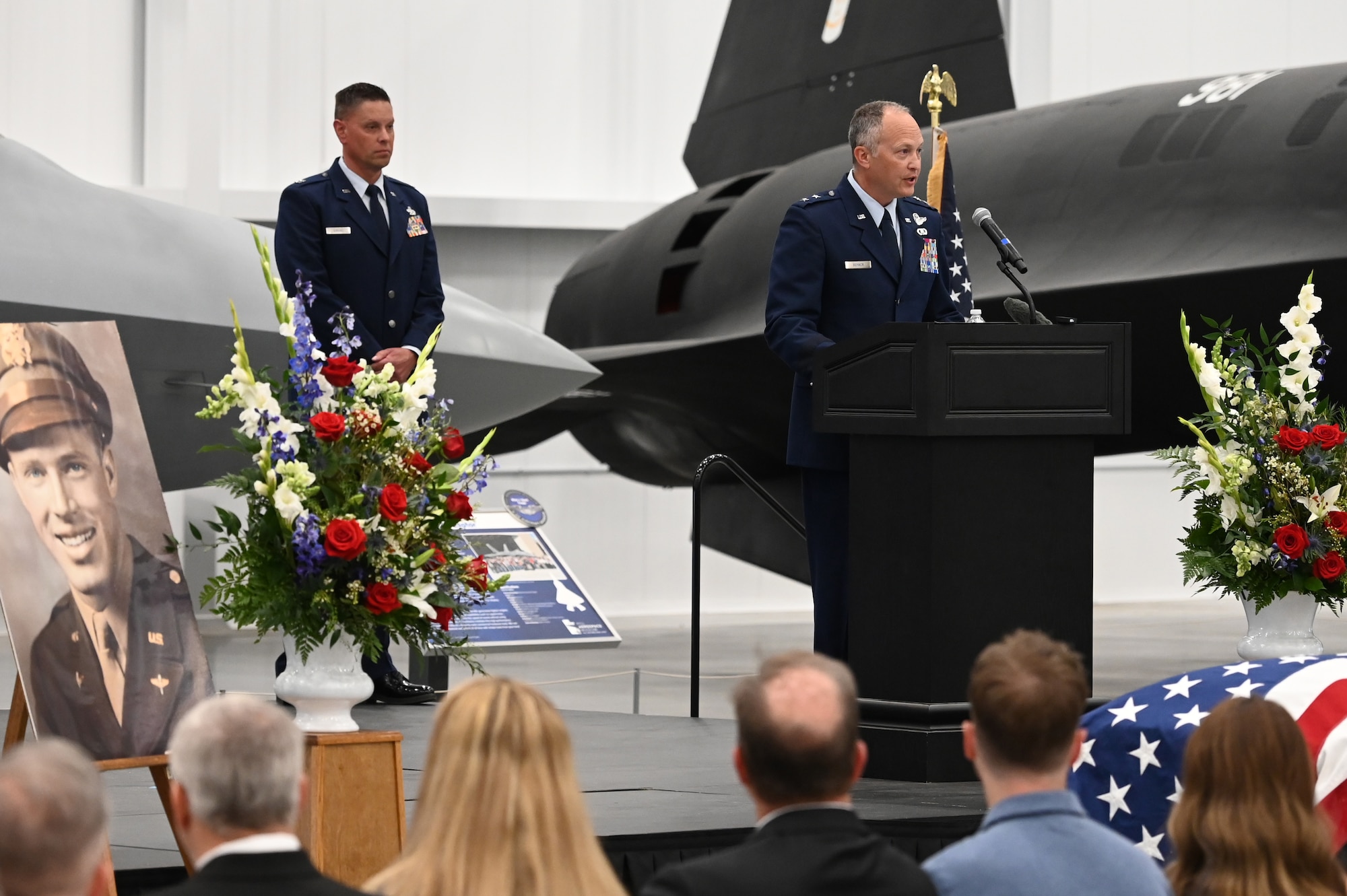 Boyack speaks to family members and guests at the memorial service.