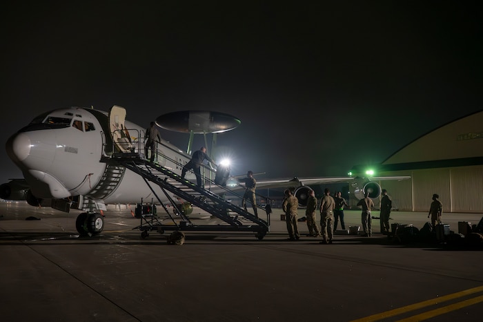 U.S. Air Force Airmen disembark and unload from an E-3 Sentry ahead of their support to exercise Resolute Force Pacific (REFORPAC) 2025 at Misawa Air Base, Japan, July 9th, 2025.
