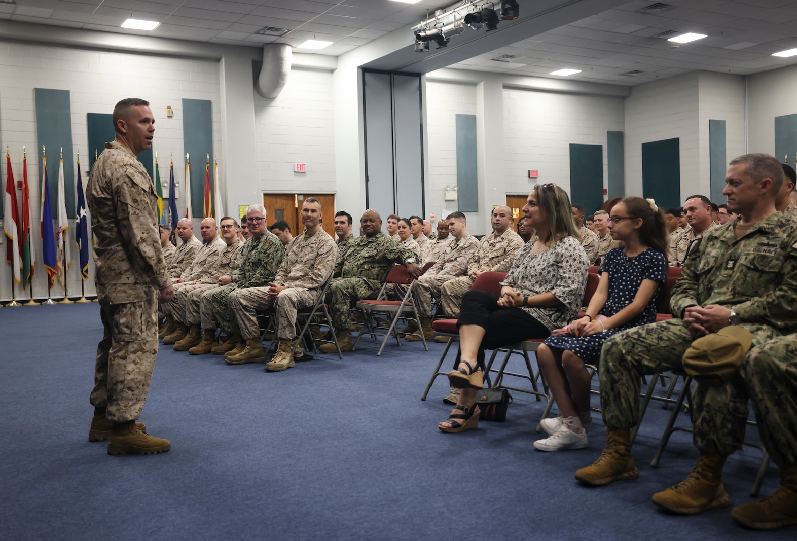 U.S. Marine Corps Sgt. Maj. Adam Gharati, the incoming senior enlisted leader of Task Force 51/5th Marine Expeditionary Brigade, addresses attendees of a relief and appointment ceremony on Naval Support Activity Bahrain, March 31, 2025. During the ceremony, Gharati assumed the role of TF 51/5th MEB sergeant major. (U.S. Marine Corps photo by Sgt. Angela Wilcox)