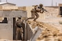 U.S. Marines assigned to Alpha Company, Fleet Anti-Terrorism Security Team Central Command participate in a close quarters battle drill at an urban terrain village training facility. (Official U.S. Army photo)