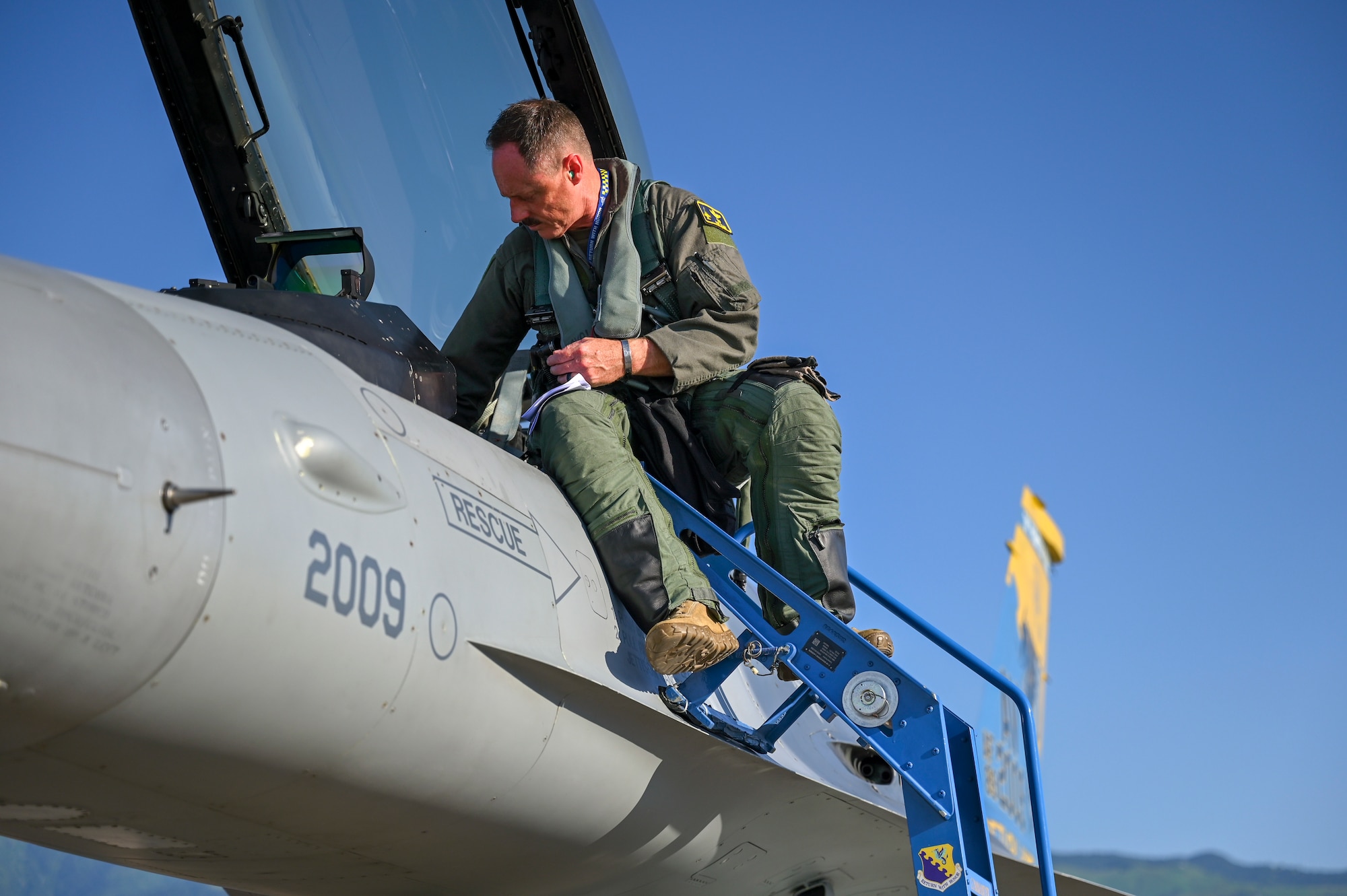 Gen. Clark prepares to enter an F-16.