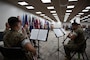 U.S. Marines with the 2nd Marine Division Band perform during the 2nd Network Battalion change of command ceremony at Tun Alley on Marine Corps Base Camp Lejeune, North Carolina, June 13, 2025. The change of command ceremony represents the passing of responsibility, authority and accountability from the outgoing commanding officer to the incoming commanding officer. (U.S. Marine Corps photo by Lance Cpl. Hunter Brock)