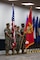 The color guard with 2nd Network Battalion, Marine Corps Cyberspace Operations Group, present the colors during the 2nd Network Battalion change of command ceremony at Tun Alley on Marine Corps Base Camp Lejeune, North Carolina, June 13, 2025. The change of command ceremony represents the passing of responsibility, authority and accountability from the outgoing commanding officer to the incoming commanding officer. (U.S. Marine Corps photo by Lance Cpl. Hunter Brock)