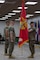 U.S. Marine Corps Sgt. Maj. Casey S. Chandler, right, passes the colors to Lt. Col. Andrew S. Walker, outgoing commanding officer, both with 2nd Network Battalion, Marine Corps Cyberspace Operations Group, during the 2nd Network Battalion change of command ceremony at Tun Alley on Marine Corps Base Camp Lejeune, North Carolina, June 13, 2025. The change of command ceremony represents the passing of responsibility, authority and accountability from the outgoing commanding officer to the incoming commanding officer. (U.S. Marine Corps photo by Lance Cpl. Hunter Brock)