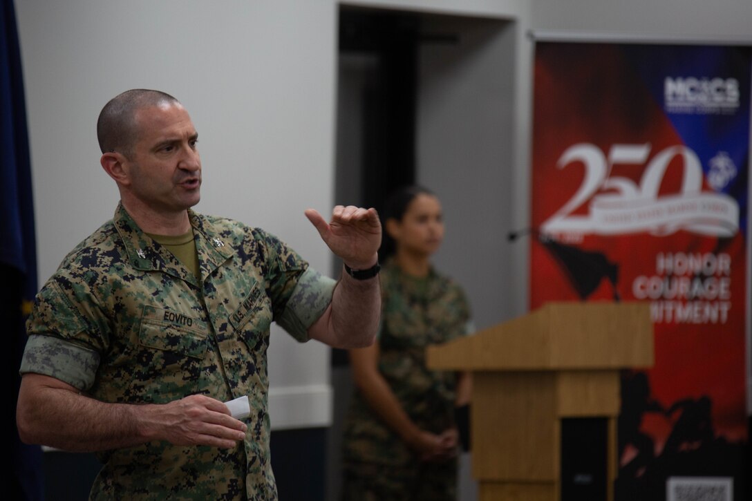 U.S. Marine Corps Col. Bryan Eovito, commanding officer, Marine Corps Cyberspace Operations Group, gives his remarks during the 2nd Network Battalion change of command ceremony at Tun Alley on Marine Corps Base Camp Lejeune, North Carolina, June 13, 2025. The change of command ceremony represents the passing of responsibility, authority and accountability from the outgoing commanding officer to the incoming commanding officer. (U.S. Marine Corps photo by Lance Cpl. Hunter Brock)