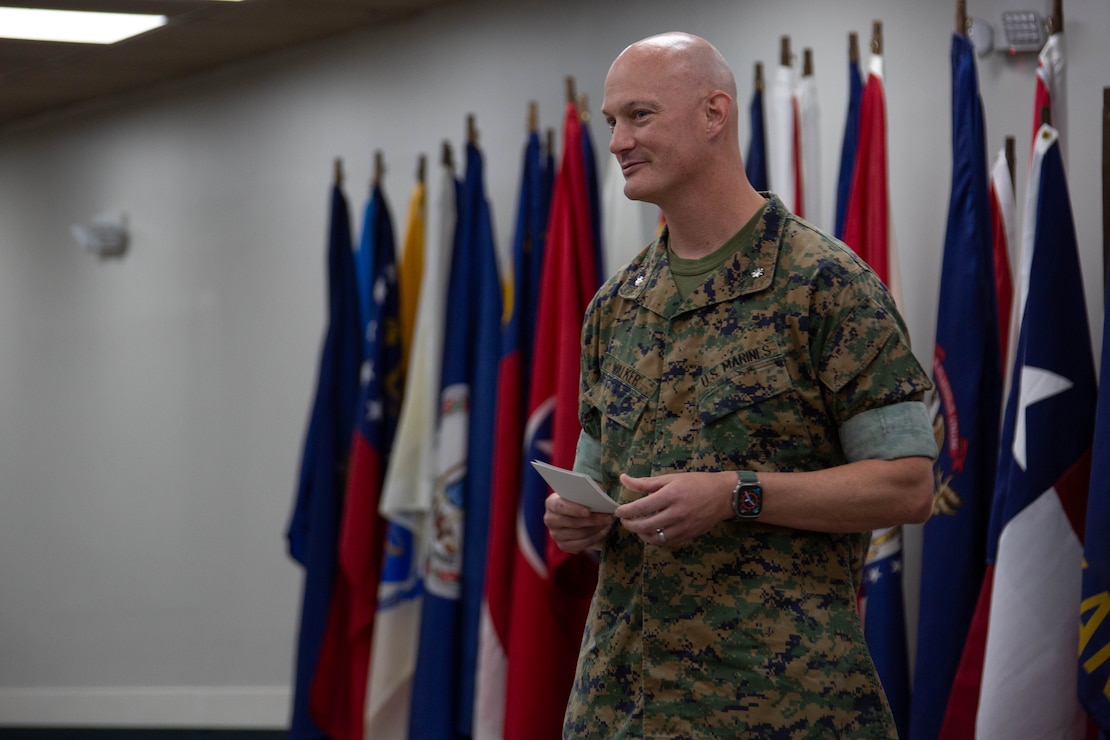 U.S. Marine Corps Lt. Col. Andrew Walker, outgoing commanding officer, 2nd Network Battalion, Marine Corps Cyberspace Operations Group, gives his remarks during the 2nd Network Battalion change of command ceremony on Marine Corps Base Camp Lejeune, North Carolina, June 13, 2025. The change of command ceremony represents the passing of responsibility, authority and accountability from the outgoing commanding officer to the incoming commanding officer. (U.S. Marine Corps photo by Lance Cpl. Hunter Brock)