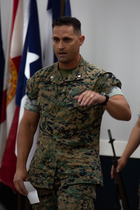 U.S. Marine Corps Lt. Col. Glenn Berdela Jr., incoming commanding officer, 2nd Network Battalion, Marine Corps Cyberspace Operations Group, gives his remarks during the 2nd Network Battalion change of command ceremony at Tun Alley on Marine Corps Base Camp Lejeune, North Carolina, June 13, 2025. The change of command ceremony represents the passing of responsibility, authority and accountability from the outgoing commanding officer to the incoming commanding officer. (U.S. Marine Corps photo by Lance Cpl. Hunter Brock)