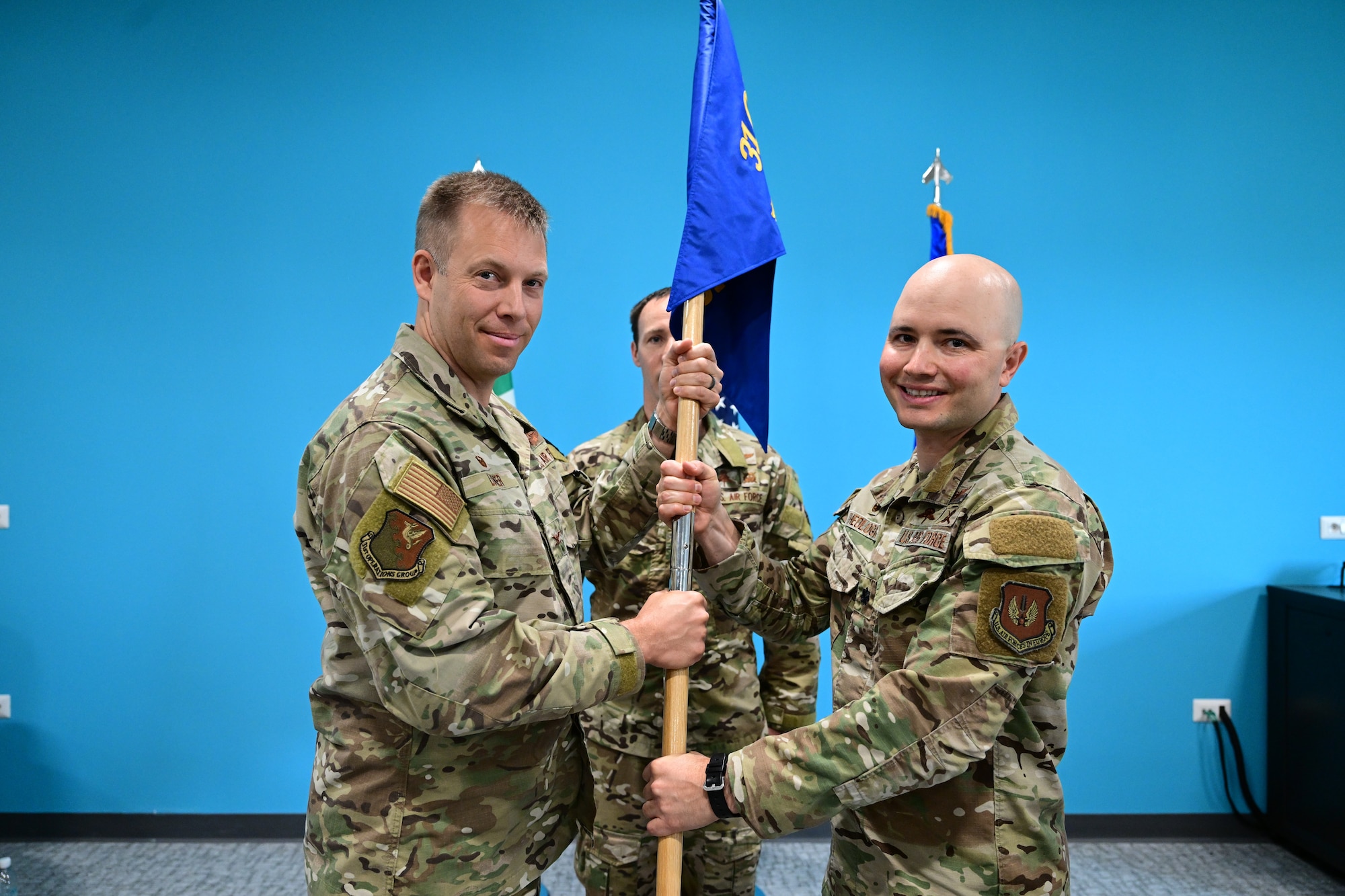 Incoming commander receives guidon during change of command ceremony