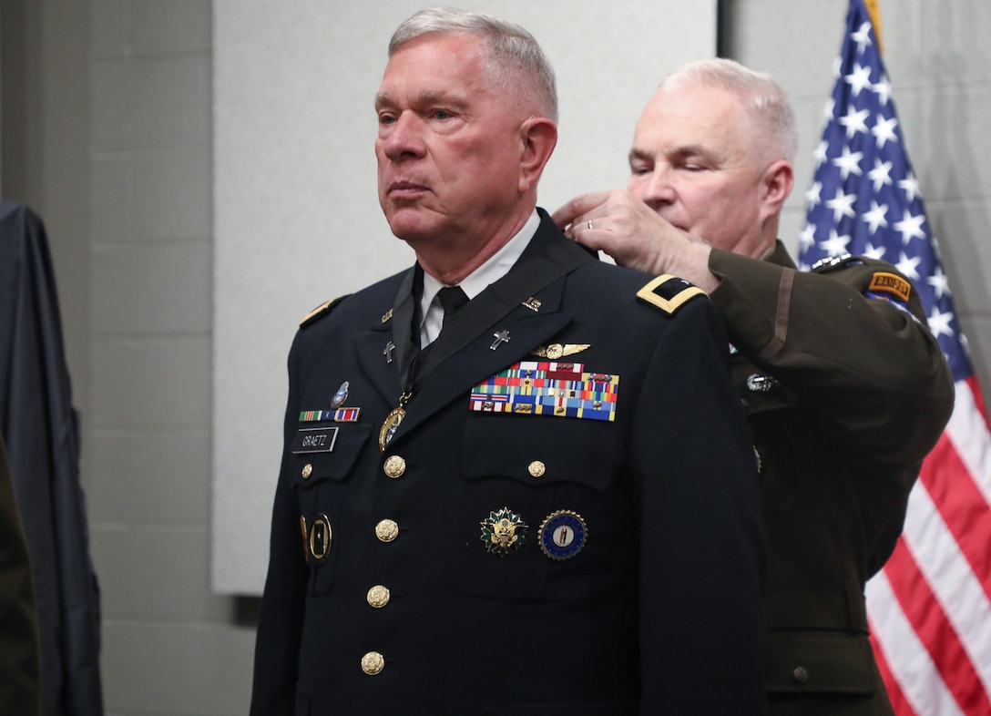 The ceremony also included the retirement of Chaplain (COL) Bill Draper.